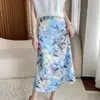 Falda floral para mujer, nuevo estilo de verano, falda de satén de acetato elástico de cintura alta, elegante falda midi de media longitud