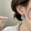 Pendientes de Moda Asimétricos de Alta Gama con Forma Fluida Plisada Chapados en Cobre Oro Real de 18 Quilates Estilo Fresco Pendientes Personalizados para Mujer