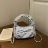 Bolso plisado estilo dulce para mujer, nuevo bolso de hombro de verano 2026, bolso cruzado tipo nube moderno y exquisito