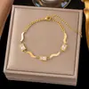 Pulsera de titanio de colores dopamina exclusiva transfronteriza para mujer, joyería de oro de 18 quilates, accesorios de diseño de nicho