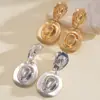 Pendientes Metálicos Estilo Sombrero Transfronterizos Europeos y Americanos, Pendientes Únicos y Retro con un Toque de Lujo de Nicho y Temperamento Elegante
