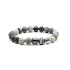 Europa y Estados Unidos transfronterizo más vendido piedra natural piedra volcánica piedra ojo de tigre pulsera de cuentas masculina imán pulsera magnética comercio exterior al por mayor