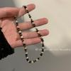 Collar vintage con piedra de ojo de tigre, cadena de suéter apilada de alta calidad, colgante de cadena de clavícula, nuevos pendientes, aguja de plata, lujo francés ligero