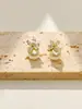 Pendientes de botón de flor y perla versátiles de moda Diseño de nicho Estilo de lujo ligero Pendientes de moda