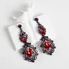 Pendientes Amazon transfronterizos, extragrandes, electrochapados, elegantes, de estilo largo, con un toque de alta gama, adornados con borlas y pedrería negra