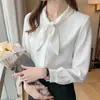 Nova camisa branca de manga longa para o início do outono com laço estiloso, blusa básica nicho estilo francês, top feminino elegante