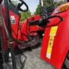 Tractor agrícola de tracción en las cuatro ruedas Dongfanghong LX904 transportador todoterreno con cultivador rotatorio y arado