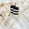 Calcetines retro de rayas para mujer otoño e invierno con pantalones de tiburón para mujer media pantorrilla gruesos cálidos ins modernos versátiles largos deportivos para mujer