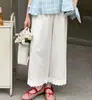 Conjunto de Verano 2026 para Niña Estilo Nuevo Bosque Infantil Conjunto de Dos Piezas para Niña con Top de Encaje de Manga Corta con Retazos y Pantalones de Pierna Ancha