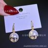 Otoño e Invierno nuevos aretes de bola goteando esmalte francés para mujer personalidad nicho diseño moda aretes de alto sentido joyería