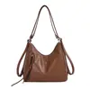 Bolsa casual de gran capacidad para mujer, nueva colección primavera/verano 2026, bolso de hombro versátil, bolsa de mano elegante y versátil, calidad de exportación
