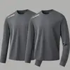 Camiseta casual versátil de manga larga para hombre para otoño, cuello redondo, color liso moderno, cómoda, transpirable y de corte holgado.