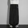 Calça de moletom listrada personalizada/estilo americano, nova coleção de outono, caimento solto, fluida, bordado color-blocking, calça esportiva casual versátil, longa, branca e cinza