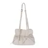 Bolsa de Axila Dulce con Volantes Estilo Coreano para Mujer 2026 Nueva Elegante Versátil Bolso de Hombro Único Lazo Pequeño Nicho Bolso de Viaje