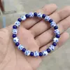 Temu Xiyin Tk Popular Transfronteiriço Pulseira de Cerâmica Lote de Pulseiras de Porcelana Azul e Branca Pulseira com Pingente Cruz