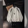 Sudadera casual de estilo americano con cremallera y corte limpio para hombre, con un diseño elegante de franjas tipo patchwork, adecuada para primavera y otoño