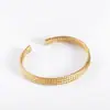 Pulsera de Acero de Titanio Europea y Americana Tejido Irregular Trenzado Twist Brazalete Abierto Estilo de Moda para Mujer Joyería de Acero Inoxidable Venta al por Mayor