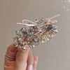 Pinza para el pelo de alta gama estilo coreano con lazo y perlas, a la moda, exquisita, de nicho, elaborada, creativa, versátil para el uso diario
