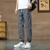 Calça Casual Fresca de Seda de Gelo Masculina Verão Novo Solta Respirável Calça de Perna Meninos Fina Mais Fácil de Combinar Calça Esportiva Nove Pontos