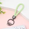 Llavero estilo creativo color pistola hebilla tejida boutique metal coche hombres y mujeres accesorios herrajes llavero Amazon