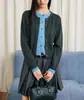 Cardigan Tricotado de Peça Falsa Dupla Estilo Intelectual Miu da Moda para Mulheres com Top de Lã Preguiçoso de Cor Contrastante
