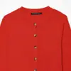 Ropa de mujer al por mayor transfronteriza 2026 otoño nuevo estilo europeo y americano manga larga cuello redondo chaqueta de punto simple 6771114