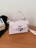 Bolso de Viaje para Mujer 2026 Nueva Moda de Primavera Bolso de Mano para Salir, Bolso Pequeño Cuadrado de Hombro Único Cruzado de Gama Alta