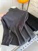 Fábrica de Suéteres Fuente Dalan Camisa Base con Borde de Volantes de Doble Capa para Mujer, Elegante Top de Punto Adelgazante de Cuello Alto Medio para Otoño