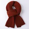 Bufanda de lana para niñas coreana de color liso bufanda pequeña otoño e invierno tejida bufanda para niños mayores Joker fábrica al por mayor