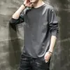 Camiseta de manga larga para hombre, capa interior de otoño para hombre, camiseta base elástica de corte holgado, camiseta estampada estilo coreano ins para hombre
