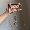 Collar Colgante Luna Dorada Estrella de Ocho Puntas Estilo Metálico Vintage para Mujer Cadena de Suéter Medieval de Nicho Único Accesorios