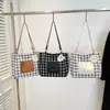 Moda Primavera 2025 Nuevo Bolso Tote para Mujer Moda Versátil Trendy Estilo Occidental Estudiante Gran Capacidad Bolso de Hombro