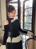 Camiseta de Manga Larga con Hombro Descubierto y Patchwork de Lunares para Mujer 2025 Primavera y Otoño Nuevo Chic Ceñida a la Cintura Bloqueo de Color Adelgazante Top Off-Shoulder de Moda