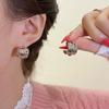 Pendientes irregulares dorados de doble tubo con diseño de nicho simple estilo Hong Kong para mujer, con personalidad diaria, a la moda, combinables con todo.