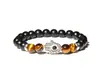 Pulsera Hecha a Mano de Ónix Negro y Ojo de Tigre con Amuleto de Hamsa Ajuste Elástico Símbolo de Protección y Buena Suerte Perfecta para el Uso Diario Regalo Ideal para Hombres Mujeres Joyería Espiritual Única
