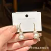 Corea del Sur Dongdaemun Nuevo Zircón Micro-incrustado Perla Calabaza Elegante Moda Sentido del Diseño de Lujo Ligero Aretes