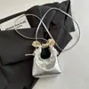 Bolso mini de diseño de nicho dulce y lindo para mujer, bolso de luna 2026, bolso cruzado de PU, bolso de mano accesorio para padres e hijos