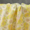 Tela decorativa jacquard de panda girasol estilo pastoral, un diseño fresco y sencillo, adecuado para ropa infantil, chalecos cheongsam y bolsos tejidos de colores.