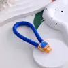 Llavero de Arco de Arcilla Cordón de Cuero Pequeño Regalo Pedrería Colgante de Llave de Metal Yiwu Pequeño Artículo Mayorista Transfronterizo