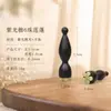 Palo de masaje de sándalo morado de 8 cuentas con forma de loto, de doble cara para acupresión y limpieza de meridianos, con un cuerno de carnero y un zhuque (pájaro rojo) diseño, para masaje ocular y facial