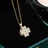 Colgante de collar de trébol de cuatro hojas transfronterizo, estilo dulce y simple, joyería elegante tipo princesa socialité con forma giratoria, venta directa del fabricante