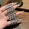 Atacado do Fabricante: Pulseira de Jade Azul Natural Xiaohongshu com Inlay de Prata S925, Design Fresco e Delicado