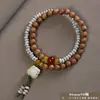 Pulseira de contas de oração budista de madeira crua natural, vendida a quente, sândalo dourado, sândalo Barbie, pulseira colecionável para homens e mulheres, fornecimento para live-stream