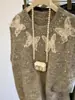 Chaleco Tejido sin Mangas con Lazo de Encaje Grueso y Perlas para Mujer Otoño Ropa de Punto de Alta Gama