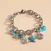Pulseira Europeia e Americana Transfronteiriça de Golfinho e Concha do Mar com Cravação de Diamantes e Gotejamento de Óleo de Estrela-do-Mar, Pulseira Estilo Resort à Beira-Mar, Atacado de Joias de Alto Padrão