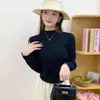 Suave suéter de punto holgado de manga larga con lazo tridimensional para mujer, diseño de otoño, único y versátil
