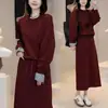 Conjunto Casual da Moda para Mulheres Primavera e Outono Hoodie Patchwork Xadrez Falso de Duas Peças Saia Longa com Cordão Conjunto de Duas Peças Transfronteiriço