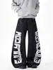 Pantalones Negros Transfronterizos con Estampado de Letras Estilo Americano, Costuras Visibles, Parches Desconstruidos, Corte Holgado, Pantalones Largos Únicos Estilo Urbano