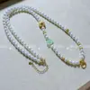 Collar de Perlas de Concha Dorada Arena Estilo Chino Antiguo Cadena Versátil Ruyi de Alta Gama para Mujer 6 mm de Largo 60 cm