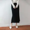Falda de punto de lana pura para mujer con aberturas laterales, nuevo estilo otoño e invierno, cintura alta elástica, adelgazante, falda bodycon de línea recta